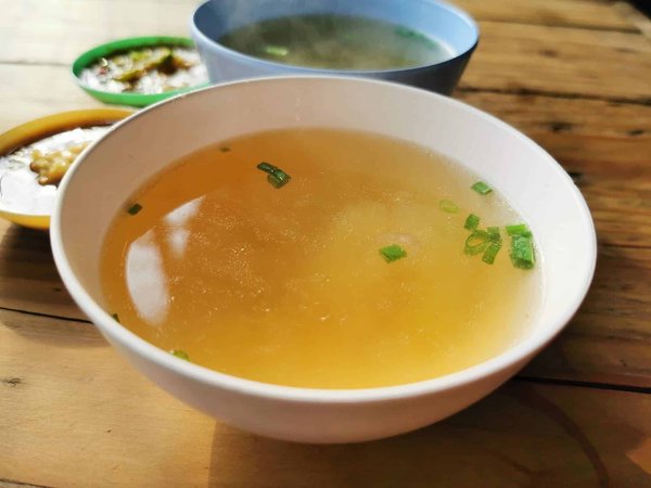 What techniques can enhance the flavor of homemade stocks and broths?